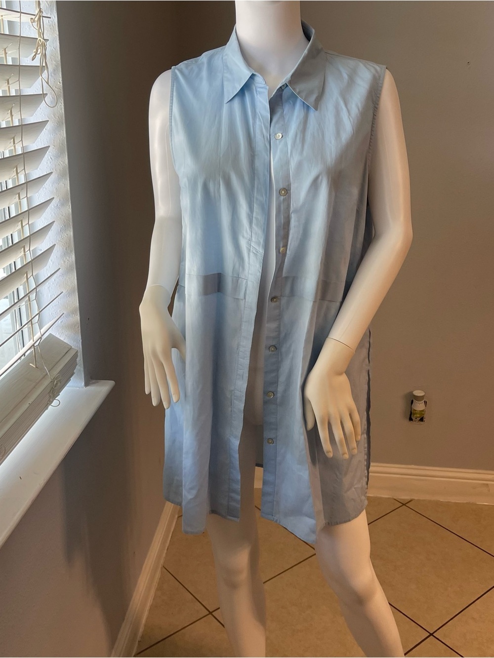 This is a light blue Forever 21 sleeveless top size medium
Like new condition - Picture 8 of 11
